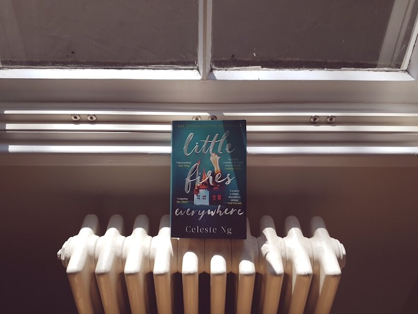Little Fires Everywhere novel sat on radiator