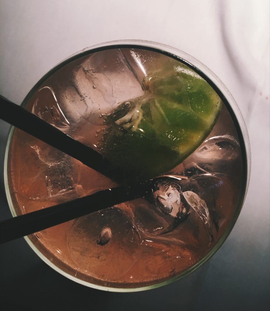 the cocktail from above with lime in it